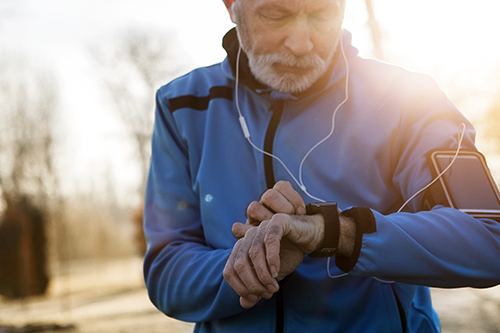 older man preparing for run